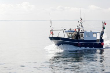 White and blue fishing boat clipart