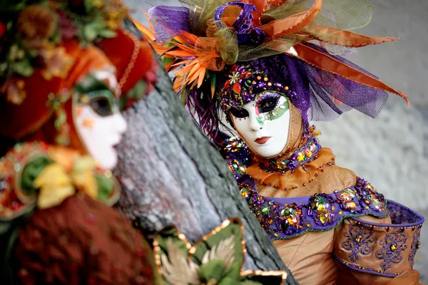 Two masks at the carnival — Stock Photo, Image