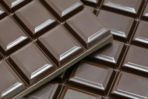 Tafeln mit Schokoladenblöcken Stockbild