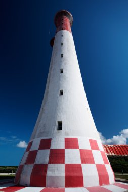 Red and white lighthouse clipart