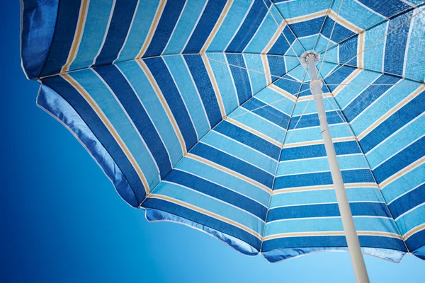 stock image Parasol against deep blue sky