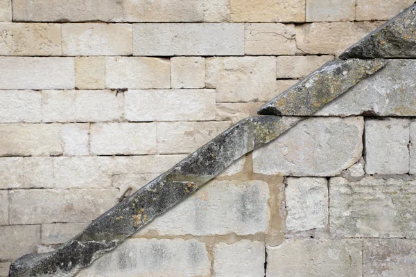 Diagonal line on a stone wall — Stock Photo, Image