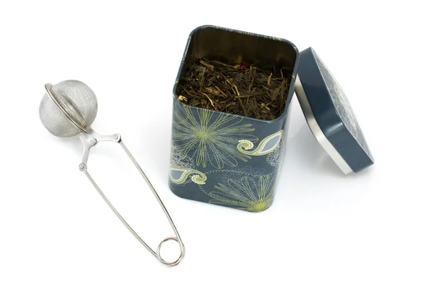 stock image Tea infuser and can