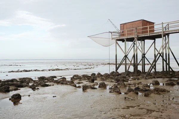 Hut at low tide — Stock Photo, Image