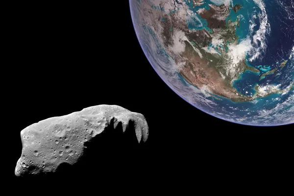 Астероид, нацеленный на Землю . — стоковое фото