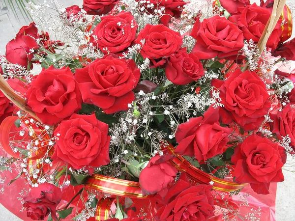 stock image Beautiful red roses with tapes bouquet