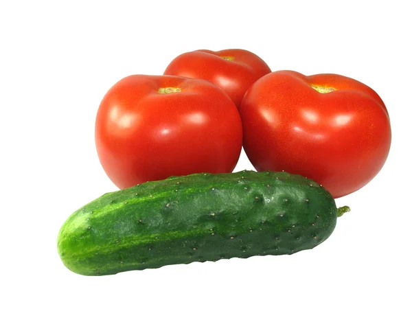 Three tomatoes with a cucumber — Stock Photo, Image