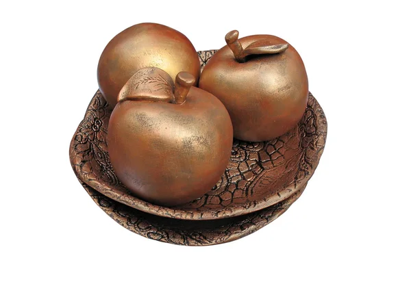 Concept de trois pommes en bronze sur assiette — Photo