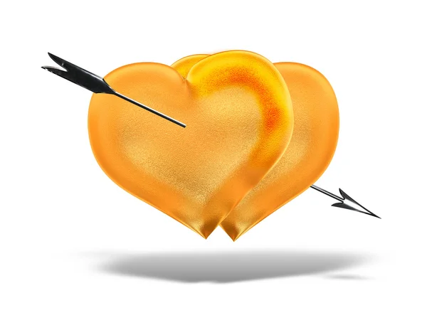 Два золоті серця зі срібною стрілкою — стокове фото
