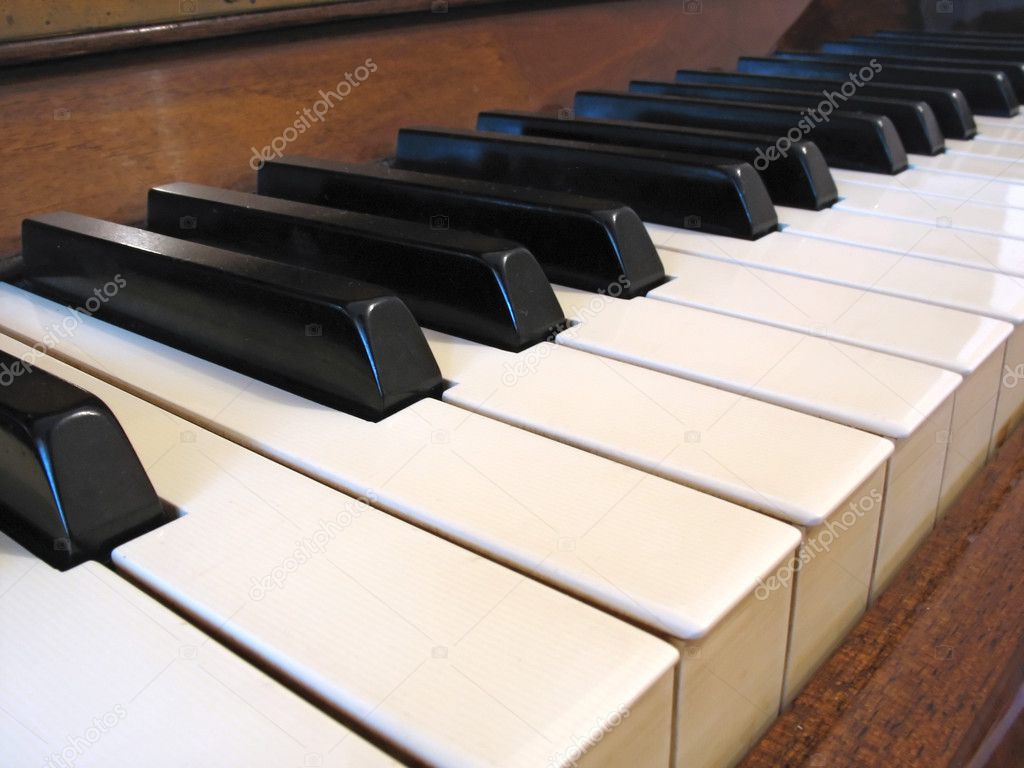 Close-up of old piano keyboard