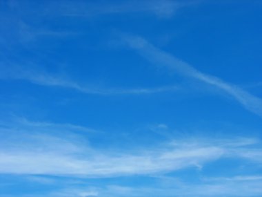 Blue sky and white high cirrus clouds clipart