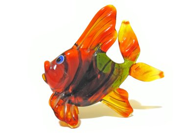 Coloured glass fish isolated over white clipart