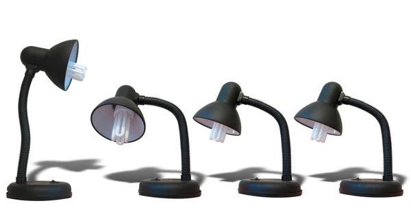 Black desk lamps over white background — Stock Photo, Image