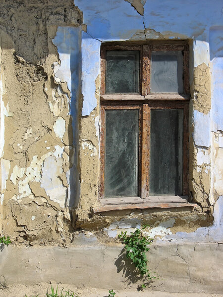 Vintage window, old brown and blue wall, abandoned house concept