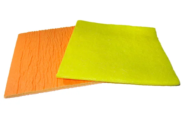 Dwie żółte i pomarańczowe serwetki na białym tle — Zdjęcie stockowe