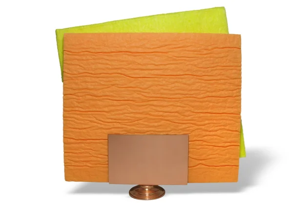Twee gele en oranje servetten op steun — Stockfoto
