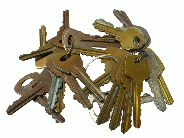 Old rusty keys isolated — Stockfoto