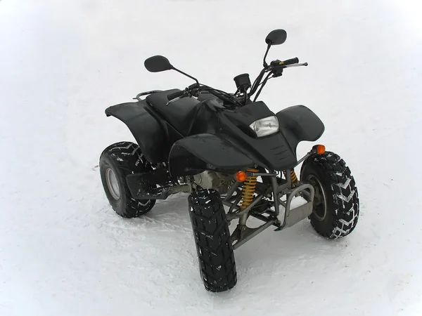 ATV black alle terrein voertuig op sneeuw — Stockfoto
