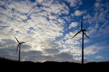 Windmill and sky conceptual image. clipart