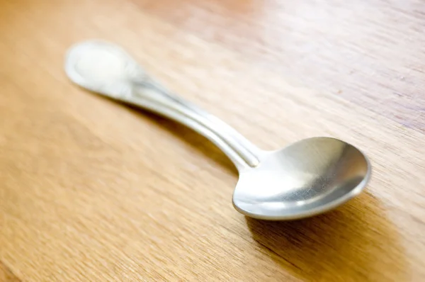 stock image Silver spoon conceptual image.