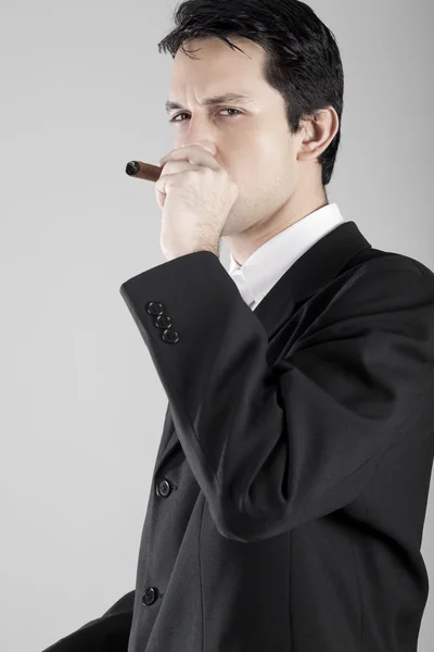 Uomo d'affari con sigaro — Foto Stock