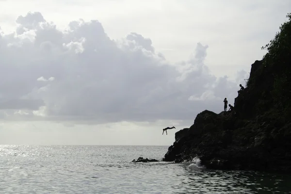 Jumping Off Rock Silhouette — Stock Photo, Image