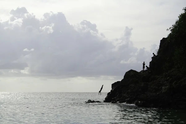 Jumping Off Rock Silhouette — Stock Photo, Image