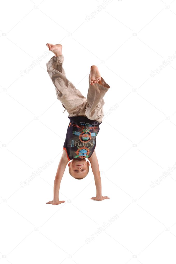 Jumping boy isolated on the white background