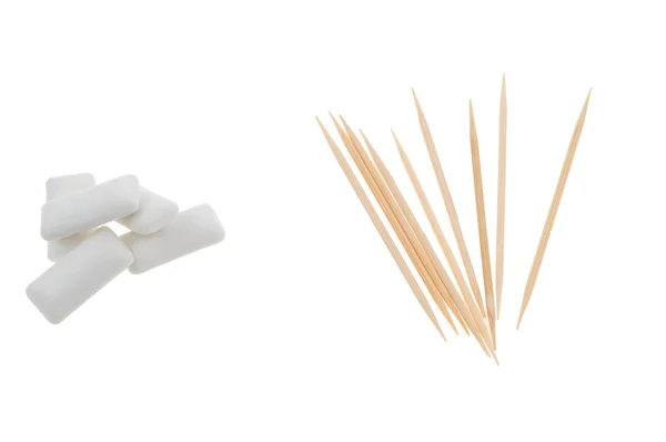 Chewing gum and wooden toothpicks — Stock Photo, Image