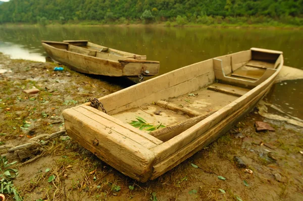 stock image Old boat near river