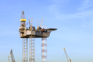 Oil rig construction clipart