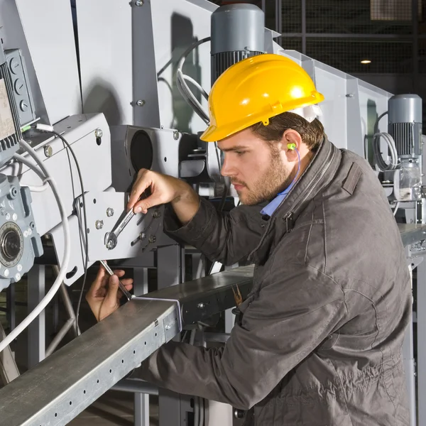 Maintenance engineer at work Stock Photo