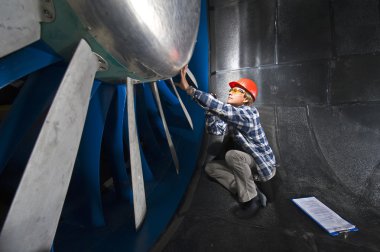 Inspecting the windtunnel clipart