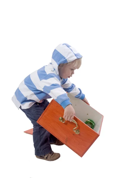 Boy lifting box — Stock Photo, Image