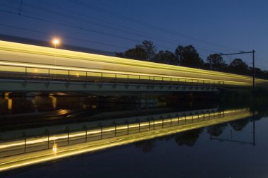 Reflection of a passing train clipart