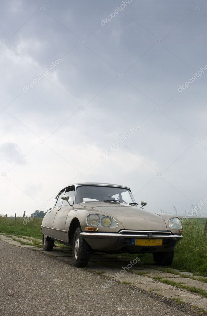 Vintage car on Dutch Dyke