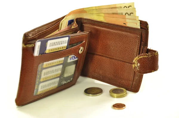 Old wallet and coins. Cut-out — Stock Photo, Image