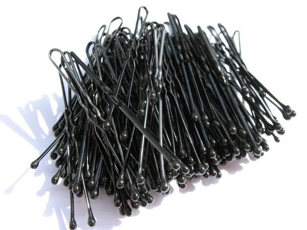 Stock image Hair-pins on a white background