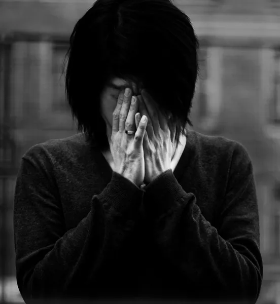 Asian man covered eyes with hands — Stock Photo, Image