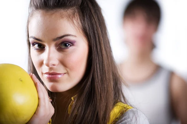 Girl with fruit and boy — Stock Photo, Image