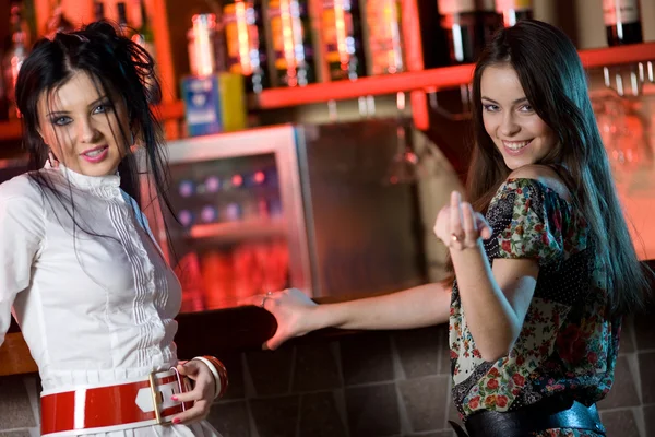 Two girlfriends in bar — Stock Photo, Image
