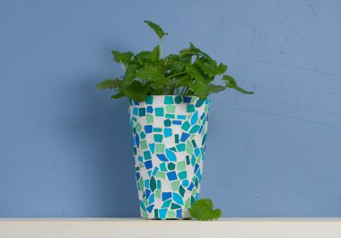 Still-life with mint in mosaic va clipart