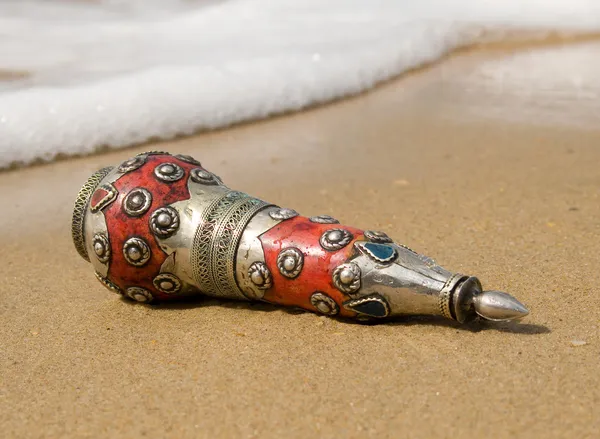 Ancient bottle cast ashore — Stock Photo, Image