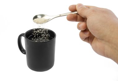 Sugar falling into a cup clipart