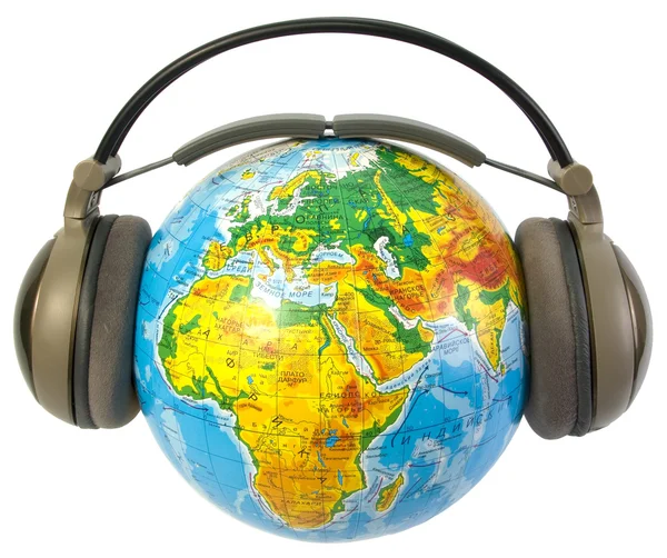 Earphones on world globe isolated — Stock Photo, Image
