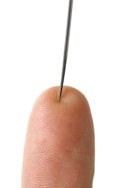 Nadel mit Finger — Stockfoto