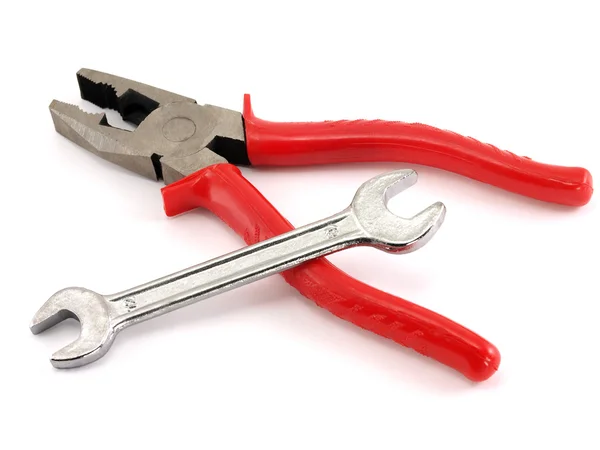 Red pliers and spanner — Stock Photo, Image