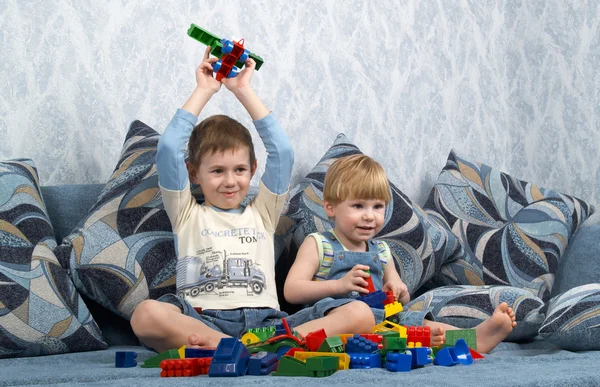Two boys play toys — Stock Photo, Image