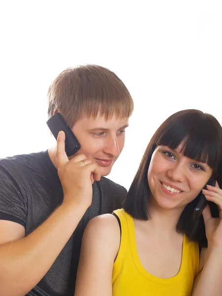 Par på telefonen tillsammans — Stockfoto