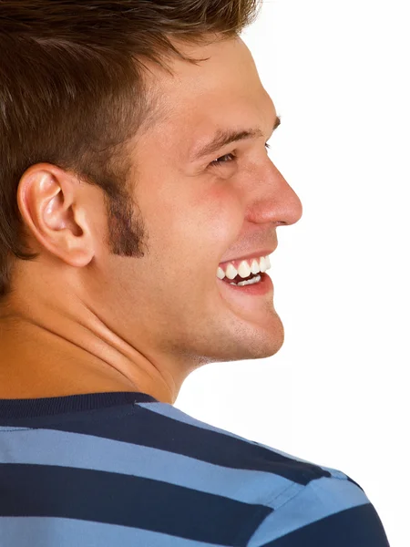 Portrét lhostejný člověk usmívá na bílém pozadí — Stock fotografie